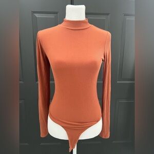 Rust Ribbed Turtleneck Bodysuit